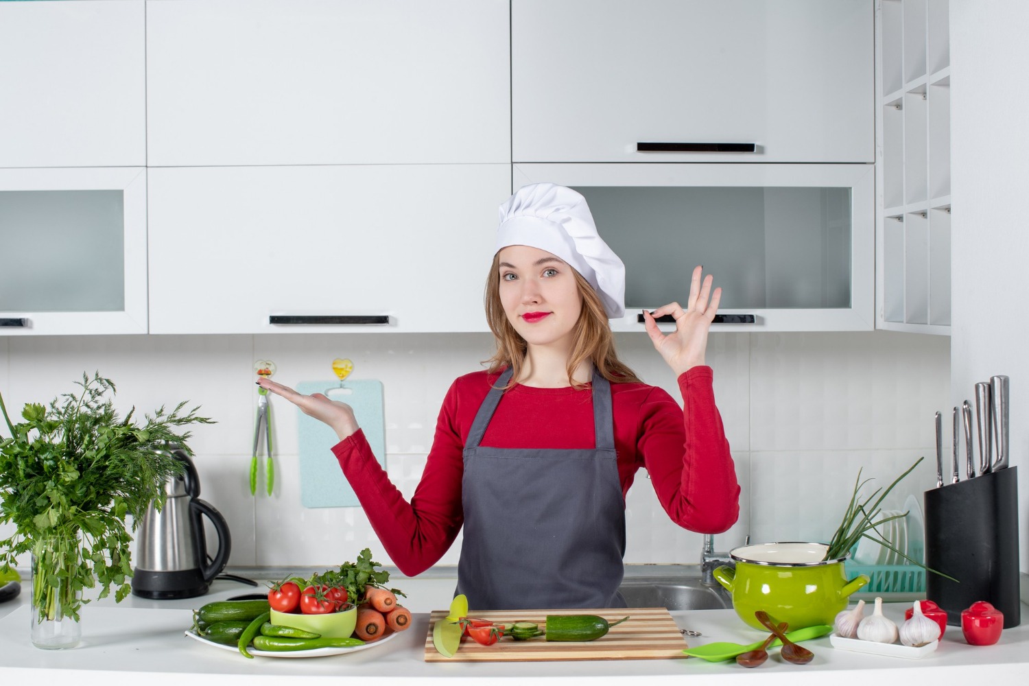 imgi_67_front-view-female-chef-apron-making-okey-sign